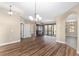 Dining room features hardwood floors and a view of the pool at 10384 Sw 41St Ave, Ocala, FL 34476