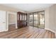 Dining room with hardwood floors, built-in hutch and pool view at 10384 Sw 41St Ave, Ocala, FL 34476