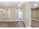 Bright entryway with hardwood floors and an arched doorway at 10384 Sw 41St Ave, Ocala, FL 34476