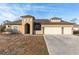 House exterior featuring a three-car garage and a neutral color palette at 10384 Sw 41St Ave, Ocala, FL 34476