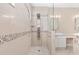 Walk-in shower with multiple shower heads and neutral tile at 10384 Sw 41St Ave, Ocala, FL 34476