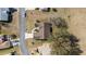 Aerial view of house, driveway, and surrounding neighborhood at 11642 Sw 71St Cir, Ocala, FL 34476