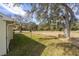 House exterior showcasing side yard and surrounding landscape at 11642 Sw 71St Cir, Ocala, FL 34476