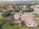 Aerial view showcasing home, patio, landscaping, and neighborhood at 1244 Se 11Th St, Ocala, FL 34471