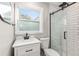 Modern bathroom with white subway tiles and a walk-in shower at 1244 Se 11Th St, Ocala, FL 34471