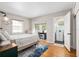 Guest bedroom with bay window and ensuite bathroom at 1244 Se 11Th St, Ocala, FL 34471