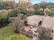 Aerial view of a backyard patio with seating area and brick wall at 1244 Se 11Th St, Ocala, FL 34471