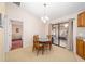 Bright dining room with sliding door access to patio at 13775 Sw 115Th Pl, Dunnellon, FL 34432