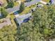 An aerial shot of a house with a gray roof and a large yard at 14146 Sw 112Th Cir, Dunnellon, FL 34432