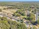 Aerial showing community homes surrounded by nature at 14146 Sw 112Th Cir, Dunnellon, FL 34432