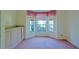 Bright bedroom with built-in cabinets and bay window at 19247 Sw 98Th Loop, Dunnellon, FL 34432