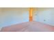 Spacious bedroom with access to another room and a large closet at 19247 Sw 98Th Loop, Dunnellon, FL 34432