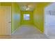 Charming bedroom with light green walls and a ceiling fan at 19247 Sw 98Th Loop, Dunnellon, FL 34432