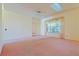 Spacious living room featuring skylights and ceiling fan at 19247 Sw 98Th Loop, Dunnellon, FL 34432