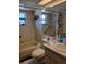 Bathroom features a tub, toilet, sink and vanity at 19950 Ibis Ct, Dunnellon, FL 34432