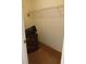 Inside a carpeted closet with a shelf and storage at 19950 Ibis Ct, Dunnellon, FL 34432