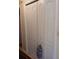 White double-door closet with built-in shelving at 19950 Ibis Ct, Dunnellon, FL 34432