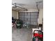 Garage with bicycles, tools and storage items at 19950 Ibis Ct, Dunnellon, FL 34432