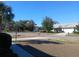 Residential street view showing houses and landscaping at 19950 Ibis Ct, Dunnellon, FL 34432