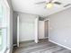 Bright bedroom with large window and walk-in closet at 201 Locust Rd, Ocala, FL 34472