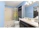 Bathroom with tub shower and updated vanity at 24 Pine Course Pl, Ocala, FL 34472