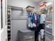 Neat closet with hanging rods, shelves, and drawers at 24 Pine Course Pl, Ocala, FL 34472