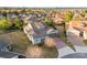 Aerial view of a house featuring brick driveway and manicured lawn at 3690 Nw 56Th Ave, Ocala, FL 34482