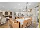 Dining room with open floor plan, seamlessly flowing into the kitchen and living room areas at 3690 Nw 56Th Ave, Ocala, FL 34482