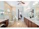 The bathroom features a double vanity, glass shower and door leading to the bedroom at 3690 Nw 56Th Ave, Ocala, FL 34482