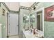 Bright bathroom with updated vanity and mirror at 3923 Manor Oaks Ct, Leesburg, FL 34748