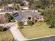 Aerial view of a single Gathering home with a large yard at 4048 Se 38Th Loop, Ocala, FL 34480