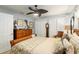 Spacious bedroom with ceiling fan, and ample closet space at 4048 Se 38Th Loop, Ocala, FL 34480