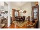 Elegant dining room with hardwood floors and a chandelier at 4048 Se 38Th Loop, Ocala, FL 34480