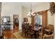 Formal dining room with hardwood floors and large windows at 4048 Se 38Th Loop, Ocala, FL 34480