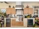 Outdoor kitchen with built-in grill and cabinetry at 4048 Se 38Th Loop, Ocala, FL 34480