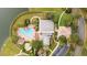 Resort-style community pool with surrounding lounge chairs and playground at 5409 Sw 42Nd Pl, Ocala, FL 34474