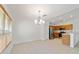 Bright dining area with tile floors and a chandelier at 5409 Sw 42Nd Pl, Ocala, FL 34474