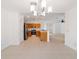 Dining room with an open view of the kitchen at 5409 Sw 42Nd Pl, Ocala, FL 34474