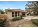 House exterior with covered patio and yard at 5409 Sw 42Nd Pl, Ocala, FL 34474