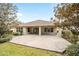 House exterior showcasing patio and landscaping at 5409 Sw 42Nd Pl, Ocala, FL 34474