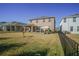 Backyard view of home, showing patio and surrounding houses at 5429 Sw 44Th Court Rd, Ocala, FL 34474