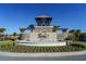 Welcoming community entrance sign with decorative water fountain and lush landscaping at 5429 Sw 44Th Court Rd, Ocala, FL 34474