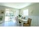 Bright dining area with sliding glass doors leading to backyard at 5429 Sw 44Th Court Rd, Ocala, FL 34474