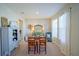 Charming dining room featuring a rustic wooden table and light-colored walls at 5429 Sw 44Th Court Rd, Ocala, FL 34474