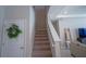 Carpeted staircase leading to the upper level at 5429 Sw 44Th Court Rd, Ocala, FL 34474