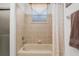 Bathroom with shower/tub combo and neutral tile at 6760 Sw 112Th St, Ocala, FL 34476