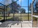 Spacious screened patio with view of the golf course at 6760 Sw 112Th St, Ocala, FL 34476