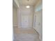 Bright entryway with tile flooring and double doors at 6915 Sw 152Nd St, Ocala, FL 34473