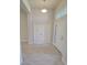 Inviting entryway featuring tile flooring, high ceilings, and ample natural light at 6915 Sw 152Nd St, Ocala, FL 34473
