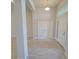 Inviting entryway featuring tile flooring, high ceilings, and ample natural light at 6915 Sw 152Nd St, Ocala, FL 34473